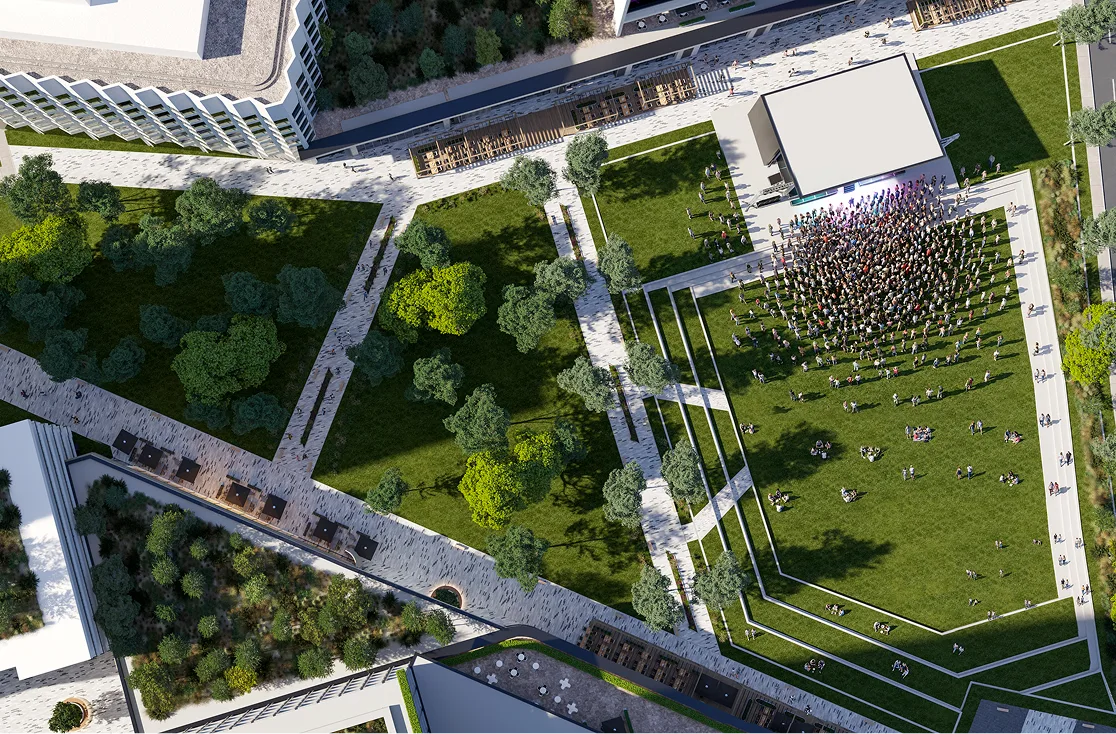 Vue aérienne de l'espace spectacles avec des gens debout regardant un spectacle.